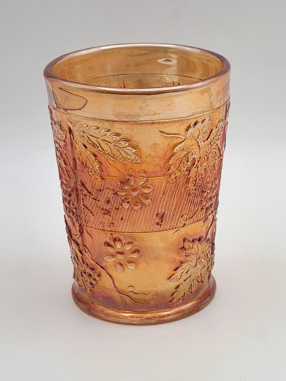 Dugan Antique Marigold Carnival Glass Floral and Grape Tumbler 4"